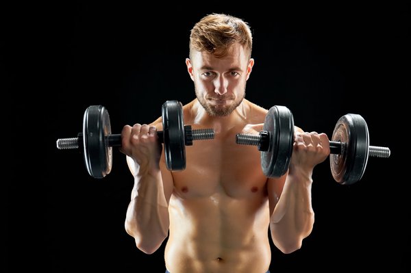 Curl biceps banc incliné : boostez vos muscles efficacement !